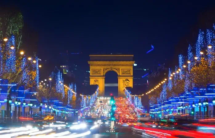 Avenue des Champs-Elysees with Christmas lighting leading up to the Arc de Triomphe in Paris, France